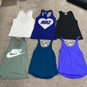 6 Nike Tanks